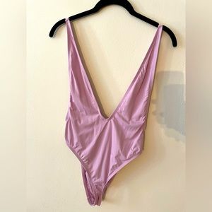 Never worn Dippin Daisy’s plunge one piece